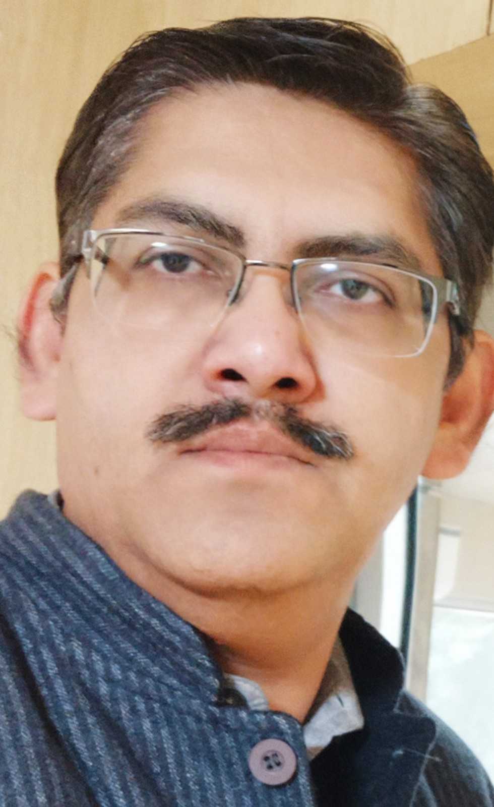 Dr. Ajay Surana
